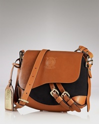 Lauren Ralph Lauren perfects heritage chic with this crossbody. Crafted from canvas and leather with buckled detailing, it's a distinctive daytime choice.