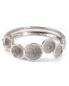 Make statement sparkle your new signature with this rhodium plated bangle from Lora Paolo. Boasting dynamic crystal-encrusted stations, this piece perfects evening elegance.