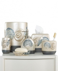 Life's a beach! Charm your bathroom in a look of seaside-inspired beauty with this Hampton Shells toothbrush holder, featuring eclectic seashells in tan and blue tones for a calming appeal.