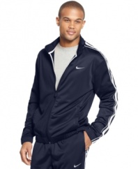 Dress the part of a pro athlete when you suit up in the ultra-smooth performance style of this Dri-Fit track jacket from Nike.