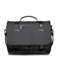 You're all business inside and out with this durable, made-to-last laptop case with rich leather trim for a conservative and sophisticated style that impresses. Packed with a laptop compartment, removable accessory pouch and multiple organizational pockets on the interior and exterior, this messenger takes smart to a whole new level. Tumi quality assurance warranty.