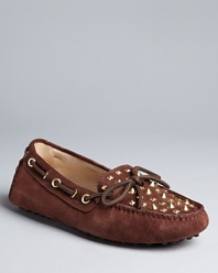 These KORS Michael Kors moccasin flats combine driving loafer style with fierce, stud accents.