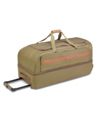 This seriously stylish duffel is designed for the frequent traveler - with an intensity that simply won't wear down. The spacious main compartment is easily accessible through a U-shaped zip opening, while a second packing area with garment straps comes in handy for organization and extra last-minute items. Full warranty.
