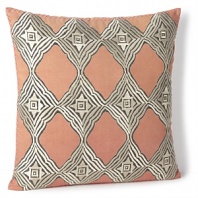 Punch up a neutral bedroom palette with this hand-printed and richly embroidered decorative pillow.