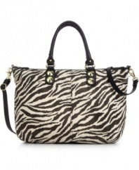 Safari is always in season. Add instant allure to you look with this zebra print design from Danielle Nicole. Polished gold-tone hardware, sturdy handles and convenient crossbody strap make this spacious silhouette the ultimate companion for any outing.