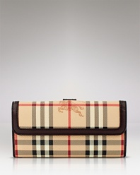 A luxe wallet in Burberry's heritage check print.