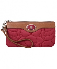 Grab hold of this casual cool wristlet by Fossil for an instant style boost. A quilted exterior with contrast stitching is accented by a signature logo plaque and silvertone hardware.