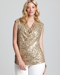 Glimmering sequins shake up the easy silhouette of this MICHAEL Michael Kors Plus top for the ultimate in laid-back luxe.