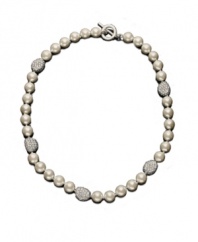 A couture collar necklace, by Lauren Ralph Lauren. Elegant glass pearl (10 mm) is accented by crystal-encrusted nuggets of silvertone mixed metal. Approximate length: 18 inches.
