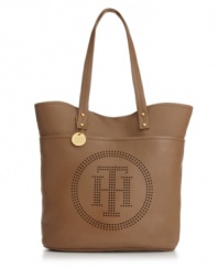 Keep your look classic with a monogram detailed tote from Tommy Hilfiger. A unique perforated front and polished gold-tone hardware add refined appeal to this travel-ready shape.