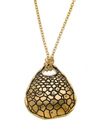 Snake charmer. Embossed python adds exotic elegance to this striking pendant necklace from T Tahari. Embellished with sparkling Colorado crystals, it's crafted in antique gold tone mixed metal. Approximate length: 32 inches + 3-inch extender. Approximate drop: 2-1/2 inches.