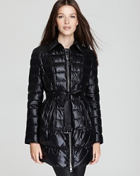 The classic Burberry Brit puffer coat gets an ultramodern update with a sleek, glossy finish. Bullish zip accents and a statement belt punctuate the puffer silhouette for utilitarian chic.