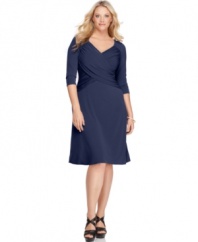Plus size fashion that will have you looking sensational and slender. This three-quarter sleeve dress from Elementz' collection of plus size clothes features a slimming panel inset and an A-line shape.
