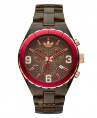 Earthy brown and bold pink collide on this sporty Cambridge watch by adidas. Translucent brown plastic bracelet and round brown nylon case with rose-gold tone and pink aluminum bezel. Brown grid-patterned dial features applied rose-gold tone numerals and stick indices, minute track, date window, three multifunctional subdials, three hands, logo and pink accents. Quartz movement. Water resistant to 50 meters. Two-year limited warranty.