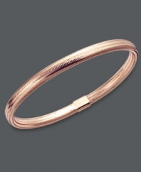 Layer it up for a fresh, new look! This unique bangle bracelet features a rose gold tone silicone setting with a 14k rose gold joint clasp. Approximate diameter: 2-1/2 inches.