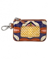 With a key keeper hook, exterior ID window and cute vintage print, this cute coin purse is a stylish tool to tuck in your purse.