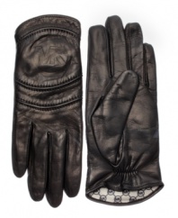 MK marks the spot. These classic gloves by MICHAEL Michael Kors are crafted from supple, logo-embossed lambskin leather.