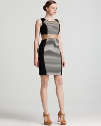 Make an impact in this Calvin Klein Petites sheath dress, boasting graphic stripes and dramatic color blocking for a striking silhouette.