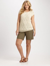 Cable-knit chic, slip into this stretch cotton top, which features a wavy pattern for an unforgettable look.V-necklineCap sleevesRibbed trimPull-on styleAbout 28 from shoulder to hem66% cotton/34% polyamideHand washImported of Italian fabric
