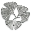 American metal designer Michael Aram's handcrafted, inspired designs reflect his fascination with nature. Imported.