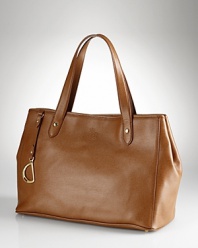 Lauren Ralph Lauren gives its tried-and-true tote an elegant update with studded details and an embossed logo.