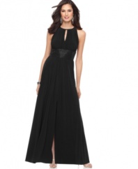 Make a stunning style statement in this evening dress from R&M Richards' collection of petite apparel. With a sexy keyhole design, beaded empire waist, and sultry slit at the skirt, you can't go wrong.