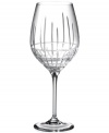 Create a stir with the classic linear cut and striking crystal elegance of the Cocktail Party goblet from Lauren Ralph Lauren.