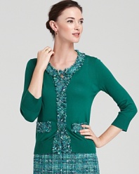 Lend luxe appeal to your layers with this kate spade new york cardigan, touting fringed tweed trim and a dazzling jewel tone for uptown sophistication.