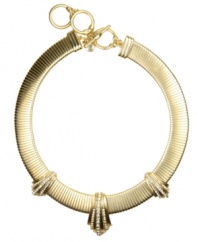 Go for the gold! A snake collar silhouette stands out on this sleek, sophisticated necklace from Jones New York. Crafted in gold tone mixed metal, it's embellished with sparkling crystal accents. Includes a toggle closure. Approximate length: 17 inches + 2-inch extender.