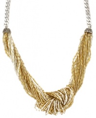 'Tis the season to twinkle! Jessica Simpson's chic knotted necklace combines multiple strands of acrylic beads in shimmery gold and silver hues. Set in silver tone mixed metal. Approximate length: 17 inches.