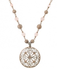 Pretty in pink. A radiant rose quartz pendant adorns this fanciful filigree necklace from 2028. With a vintage-inspired aesthetic, it's crafted in pewter tone mixed metal. Approximate length: 16 inches + 3-inch extender. Approximate drop: 1-3/4 inches.