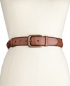 Bohemian beauty. Polish off your look with the casually vintage vibe of this braided leather belt by Fossil.