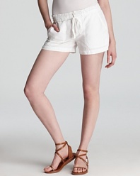 The summer essentials: Vince white linen shorts--easy, go-anywhere style in a relaxed, versatile silhouette.
