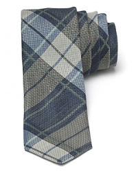 A smart check pattern offers a classic design in a modern skinny shape for an overall super-cool tie from John Varvatos Star USA.
