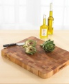 Move to the block. This professional grade cutting board makes slicing and dicing safe and easy. Oiled end-grain maple wood resists chips and nicks for long use. Finger slots provide a secure grip. One-year warranty.