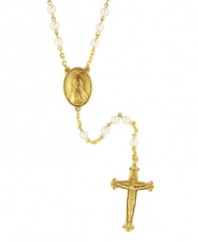 Show your devotion with dramatic style. Rosary-style necklace by Vatican features an intricate crucifix and polished glass pearls set in gold tone mixed metal. Approximate length: 26 inches. Approximate drop: 6-1/4 inches.