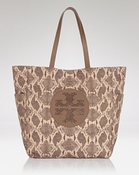 Clean lines and a strong shape makes Tory Burch's tote bag both classic and modern. Crafted from durable nylon and trimmed in leather, it's a practically perfect for running errands.