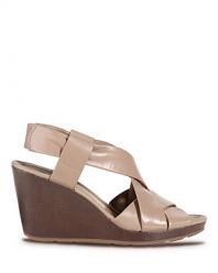 A bold platform sandal in big, bright color with a sleek wedge for beautifully balanced style. From Cole Haan.