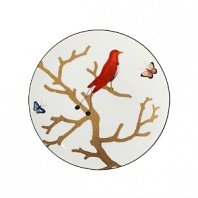 Embellished with a red-feathered bird perched on a golden branch, this nature-inspired porcelain salad plate from Bernardaud brings an elegantly fanciful look to your table.