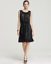 Dark yet delicate, this DKNY dress pairs all-over lace with a feminine silhouette for a look brimming with effortless romance. Team with pearls for head-to-heel polish.