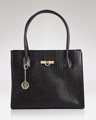 The textured trend proves right for daytime with this leather tote from DKNY. Designed for stylish versatility, it goes from corporate to casual without a slip in style.