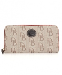 Dooney & Bourke offers a demure display of signature practicality with this classic wallet. Featuring the iconic emblem and signature jacquard exterior, this wallet will seamlessly carry over from season to season.