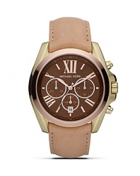 An elegant choice on duty or off. This two-tone watch from MICHAEL Michael Kors boasts a boldly sized face, roman numeral indexes and a distinctive leather strap.
