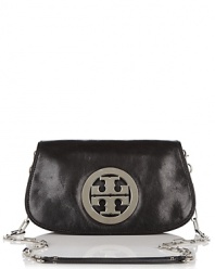 Add a glamorous finishing touch to your look with this luxe metallic leather clutch from Tory Burch.