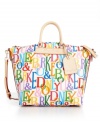 Color yourself fabulous! This roomy design from Dooney & Bourke features a colorful signature print, solid trim and luggage tag at handle base. Perfect for a long day of shopping.