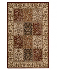 A myriad of floral designs create a timeless and elegant mosaic of rich color upon this Nourison area rug. With its opulent 100% natural wool construction, this yarn-dyed and meticulously hand-tufted rug offers a beautiful accent to traditional home décor. (Clearance)