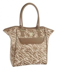 A true adventurer! Embrace the animal inside with this chic and exotic everyday tote that welcomes ease and style into your trip. A fully-stocked tote with endless organizational and sorting features keeps you going at full speed throughout the day. 10-year warranty. (Clearance)