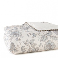 A soft palette and a floral print make this cotton duvet easy on the eyes. Features a striped print on reverse.
