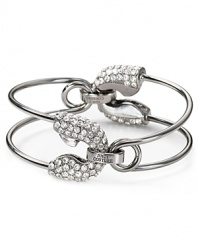 Equal parts pretty and punk, this Juicy Couture cuff bracelet features a mix of glass stones and edgy safety pins.