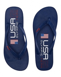 A comfortable thong sandal is crafted with sturdy rubber straps and bold country graphics, celebrating Team USA's participation in the 2012 Olympic Games.